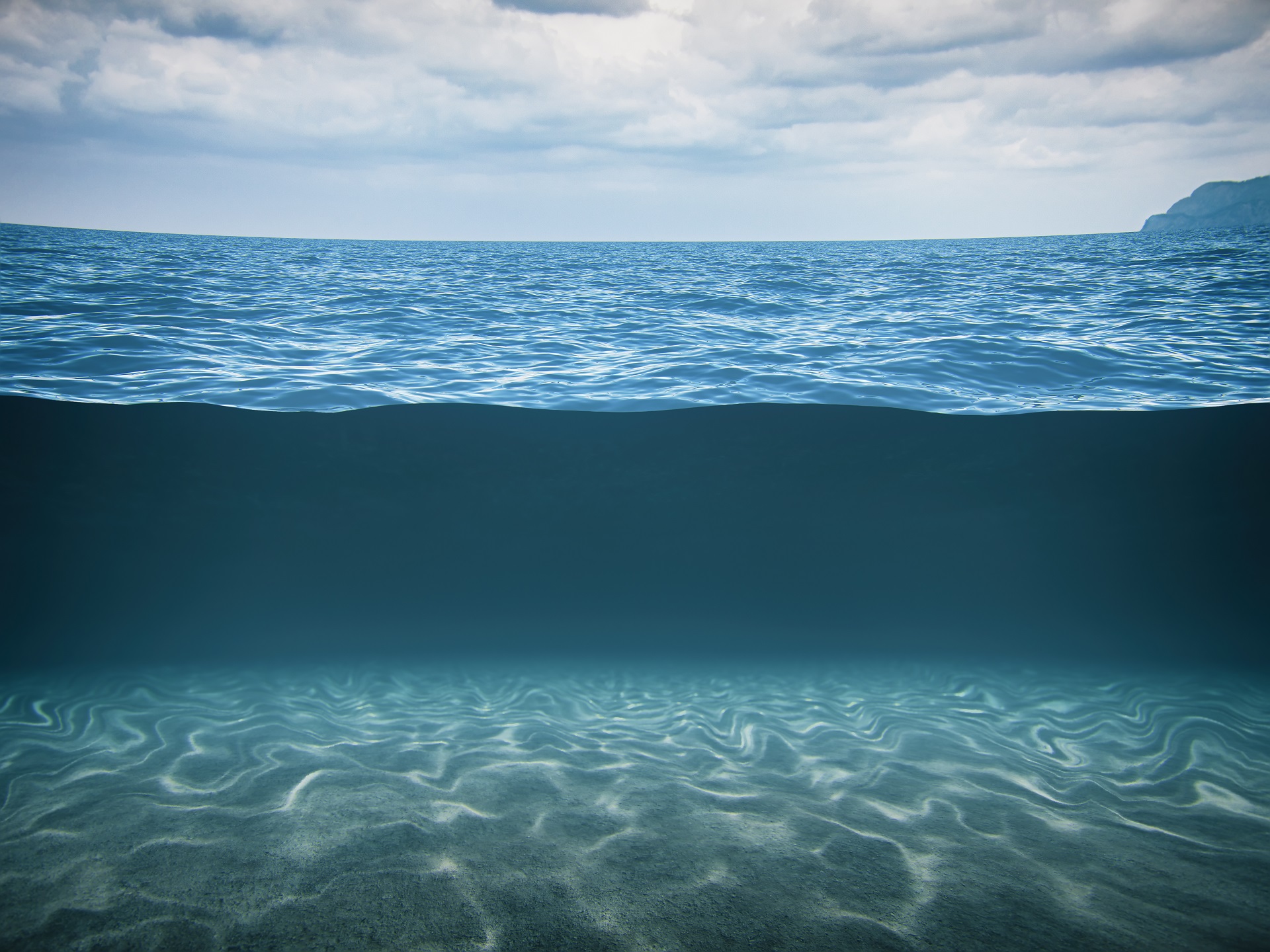 Split Shot Of The Deep Blue Sea